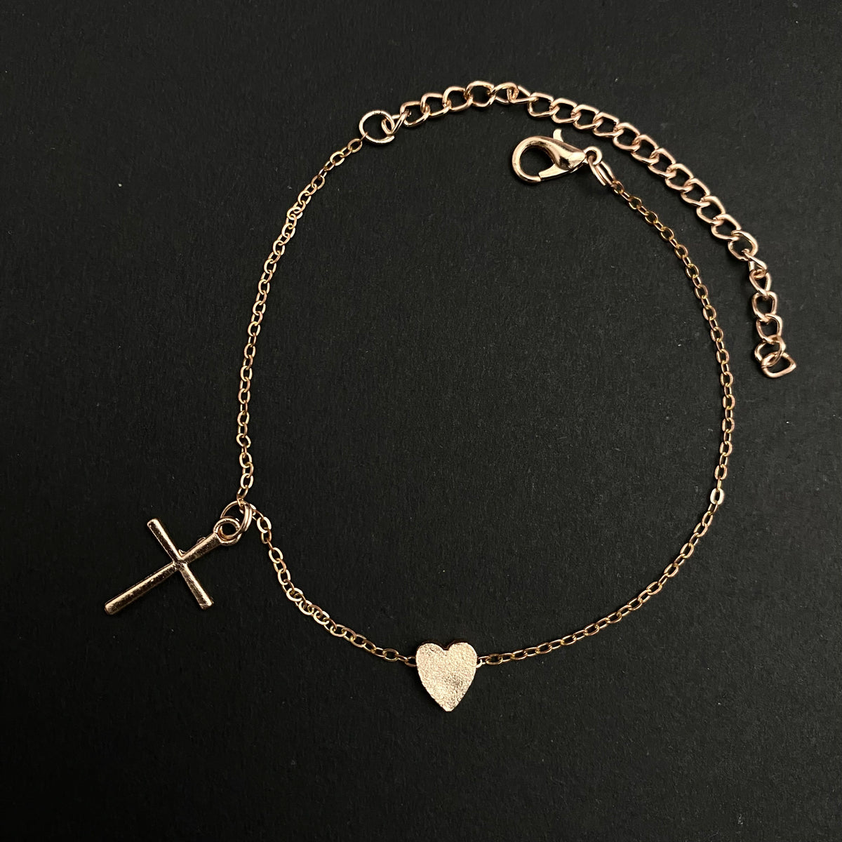 Adjustable Golden Cross Charm Bracelet With Small Heart Charm Oralia India