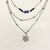 Triple Layered Snow Flake Necklace With Double Evil Eye