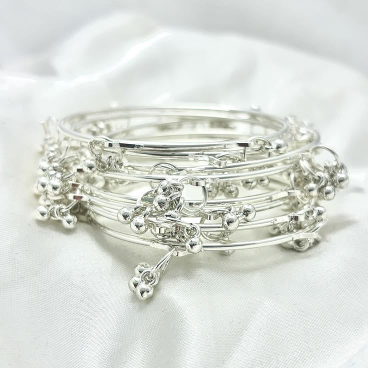 Trendy Pack Of 12 Transparent Bangles With 8 Silver Plated Ghungroo Ba ...