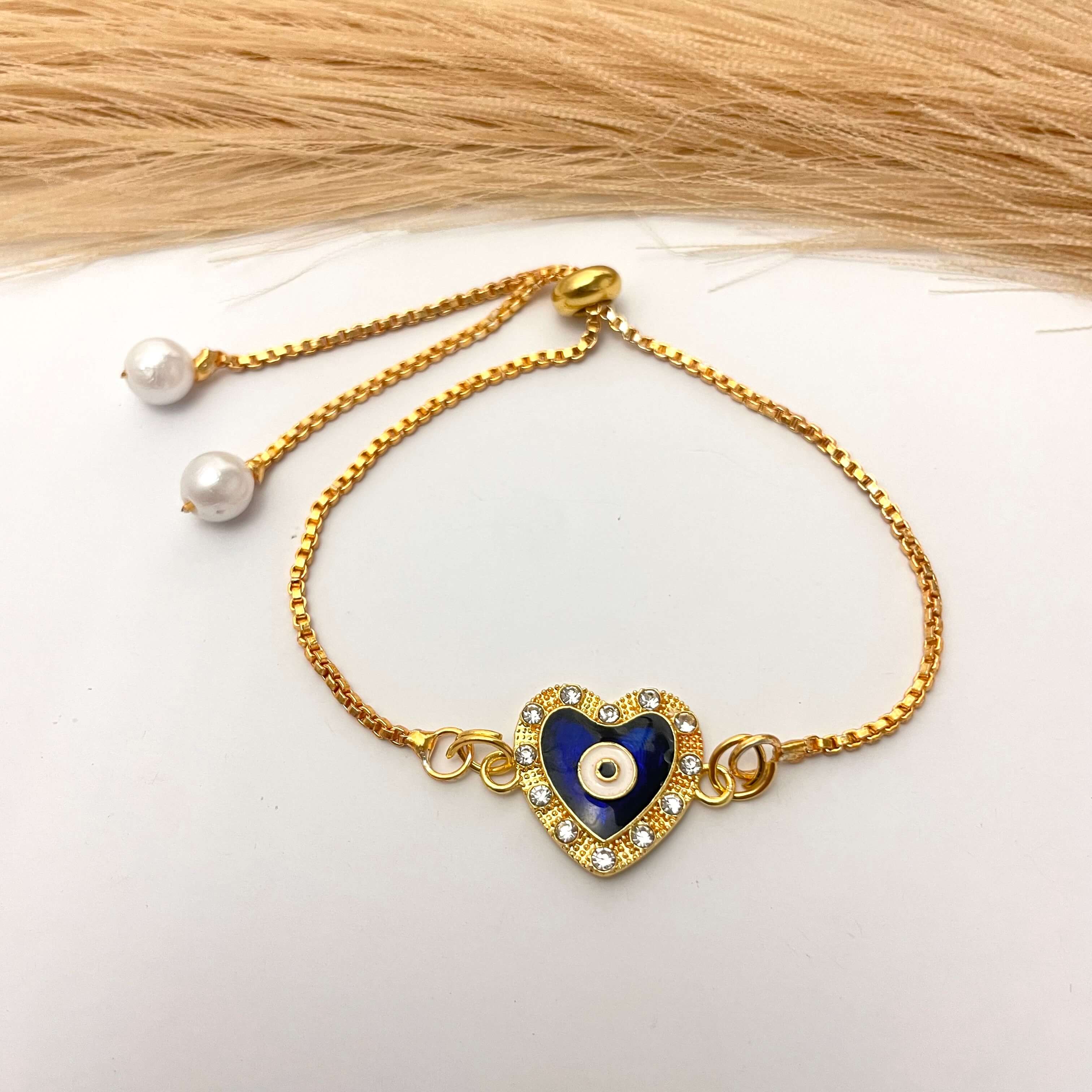 Adjustable Alloy Cute Heart Designed Evil Eye Charm Rakhi Cum Bracelet For Brother